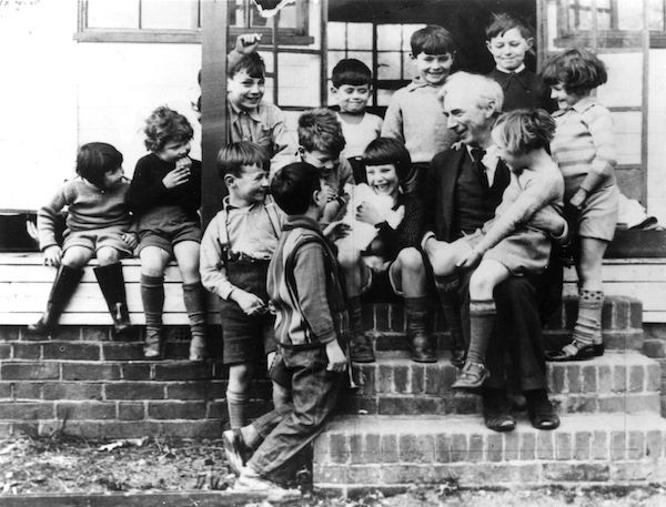 Bertrand Russell (1872 – 1970) with a group of children at Beacon High School. (Photo: Keystone/Getty Images, 1950.)