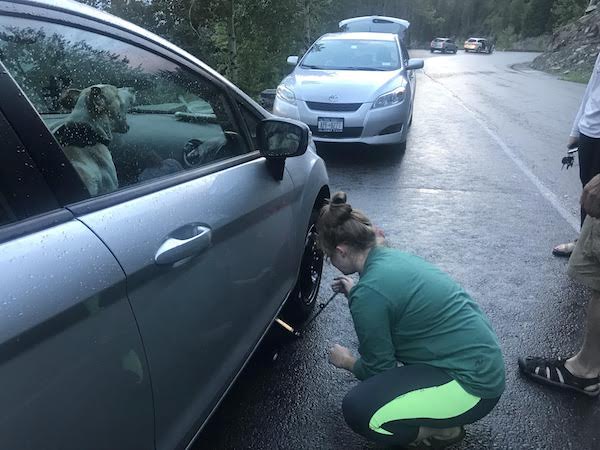 Finishing the tire change.