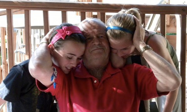 Ray White with granddaughters McKenna and Rachel.