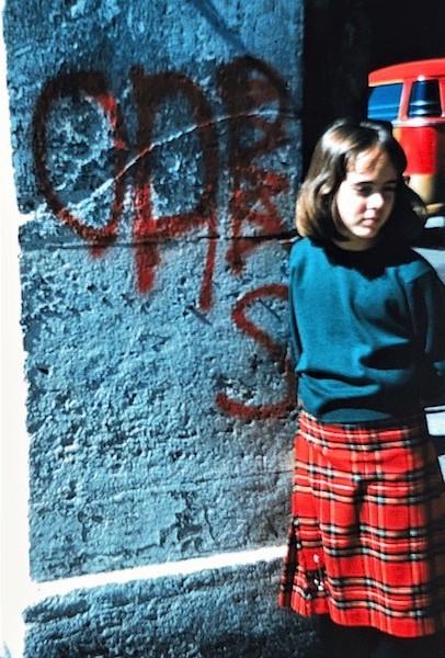 In a Scottish kilt and sweater, 1962.