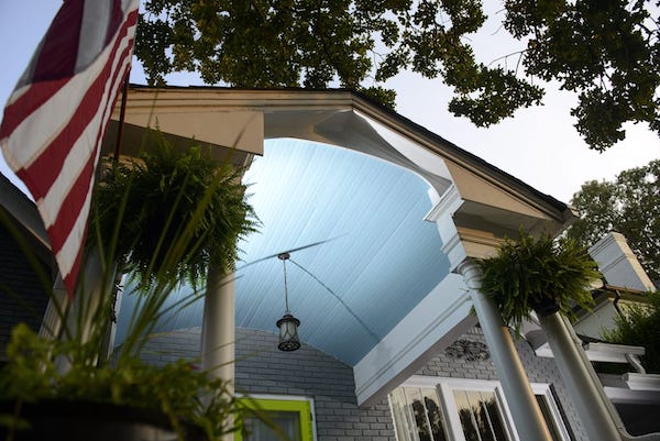 Eisiminger A haint-blue Southern porch ceiling.