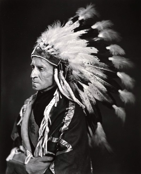House The Lord Tweedsmuir aka John Buchan in Native headdress, 1937. Photo: Yousuf Karsh.