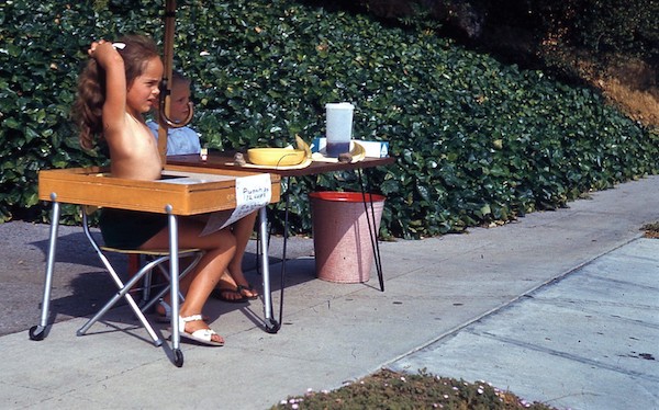 With Christa Russell, peddling lemonade on Crestford Drive. (Photo: F. Jack Herring.)