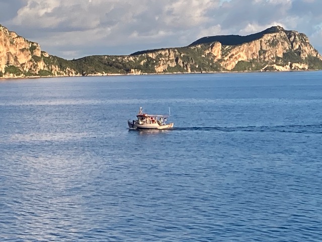 Typical fishing boat in Navarino Bay with Sphakteria as a backdrop: timeless Greece. (Photo: Petros Ladas.)