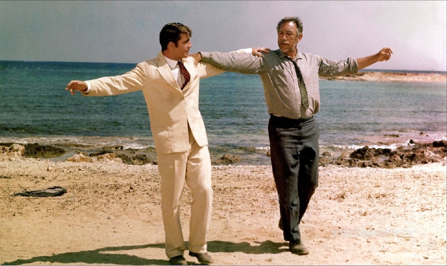 Zorba and Basil dance. (Photo: “Zorba the Greek,” Directed by Michael Cacoyiannis.)