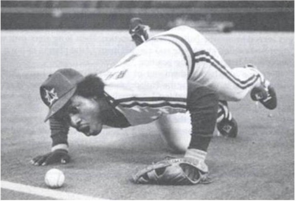 Lenny Randle of the New York Mets trying to blow a ball foul.