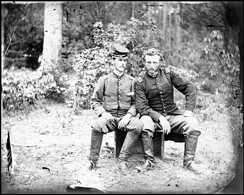 Capt. George A. Custer, of the 5th Cavalry in the Union Army, with a Confederate prisoner, Lt. James B. Washington, who happened to be Custer's former classmate. (Photo: Library of Congress.)