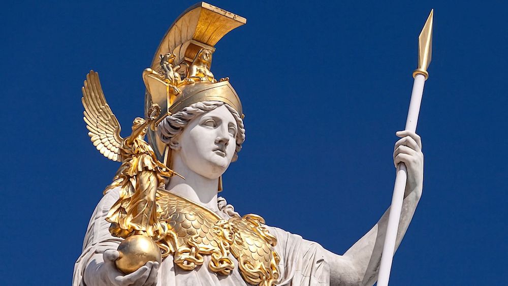 Pallas Athena with her spear, against the “dangerous blue light” of Greece. (Photo: Pinterest/Facts.net.)