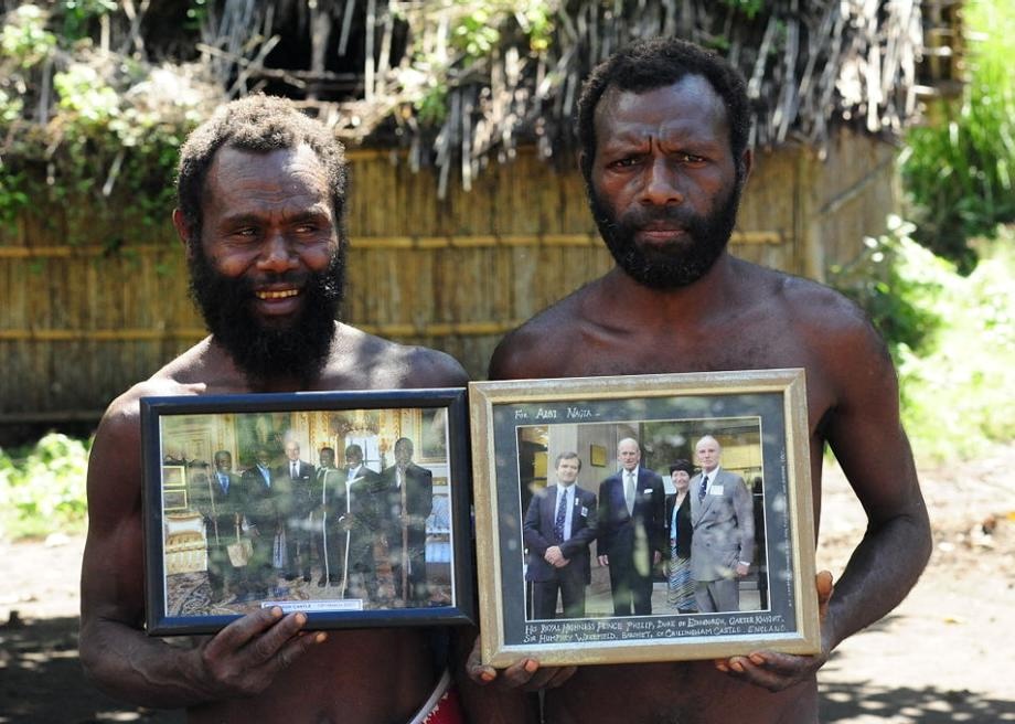 Tanna islanders with photos of Prince Philip. (Photo: Christopher Hogue Thompson.) A haint-blue porch ceiling.