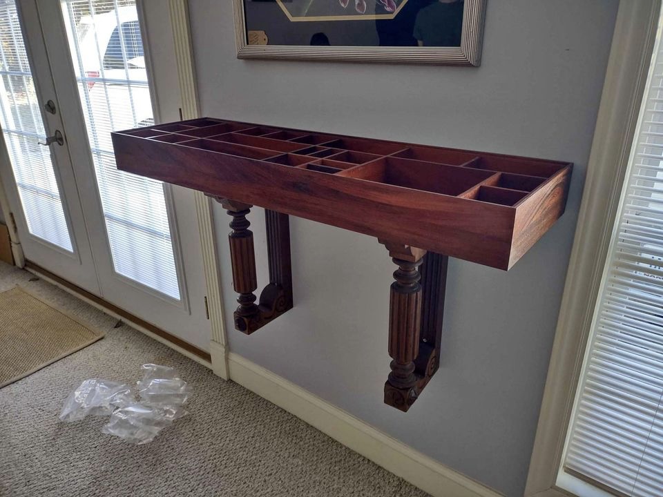 Handmade shadowbox wall bar with glass top, $250, Harrisburg NC,Handmade shadowbox. Lots of sections for displaying treasures. Has a thick glass top that sets into place. There is a small hole with cap as a way of pushing up the glass for removal. Mounts to the wall.