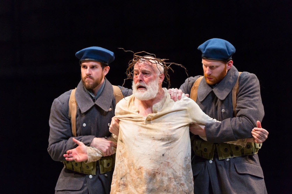 Tyler Miller (Soldier), Stephen Yoakam (King Lear), and Kevin Gotch (Soldier) in the Guthrie Theater’s production of “King Lear,” by William Shakespeare and directed by Joseph Haj. (Photo: T. Charles Erickson/Guthrie Theater.)