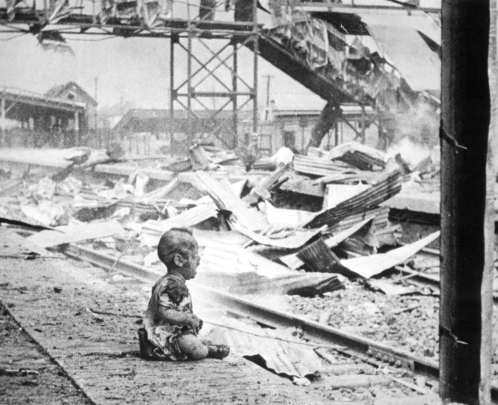 “Bloody Sunday,” 28 August 1937 photo taken a few minutes after a Japanese air attack struck civilians during the Battle of Shanghai in the Second Sino-Japanese War. (Image Source: Wikipedia/H. S. Wong.)